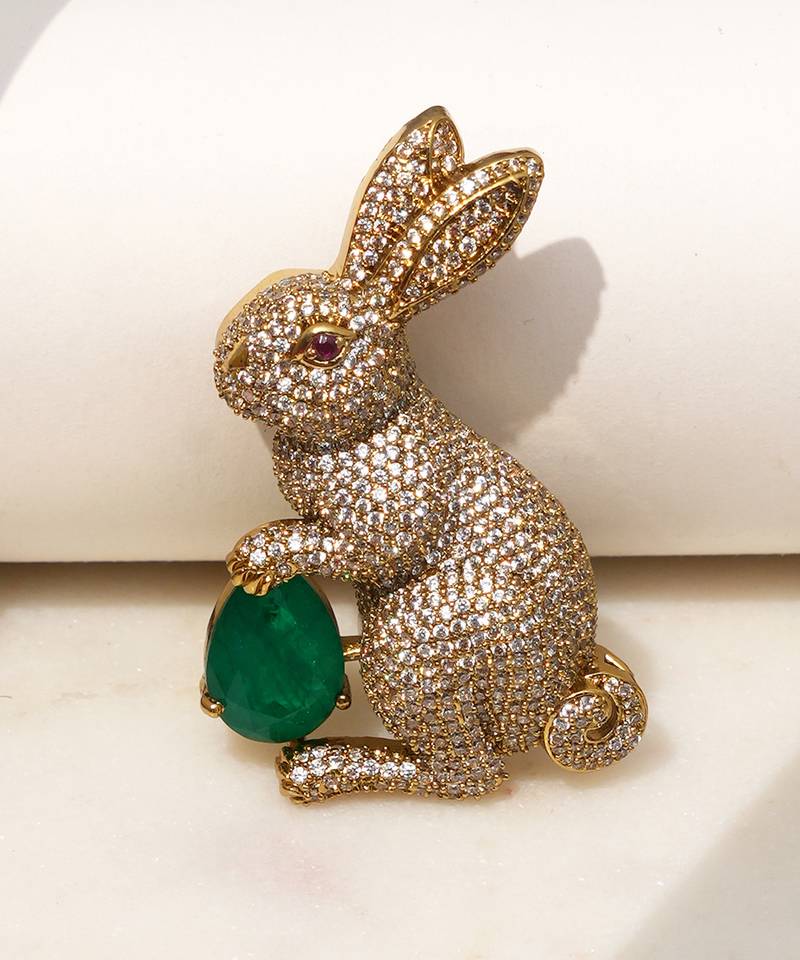 Gold plated emerald green stone rabbit motif brooch