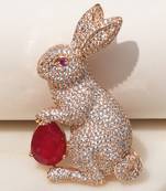 Gold plated ruby red stone rabbit motif brooch