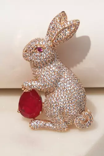Gold plated ruby red stone rabbit motif brooch