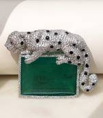 Silver plated green stone crouching leopard brooch