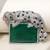 Silver plated green stone crouching leopard brooch