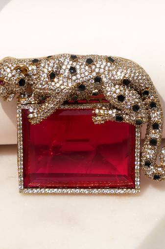 Gold plated ruby red stone crouching leopard brooch