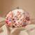 Oval floral birds print clutch bag for women with detachable strap
