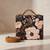 Black floral print suitcase style clutch bag for women with detachable strap