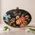 Black & orange floral printed half moon clutch bag for women with detachable strap