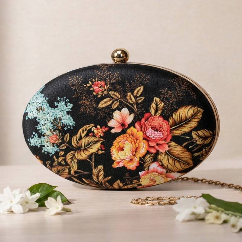 Black & orange floral printed half moon clutch bag for women with detachable strap