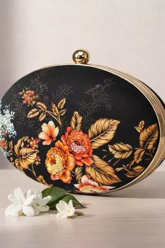 Black & orange floral printed half moon clutch bag for women with detachable strap