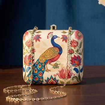 Biege based peacock printed clutchbag for women with detachable strap 1