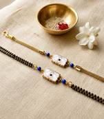 Elegant minimal evil eye bhaiya bhabhi rakhi set with pearl tassels