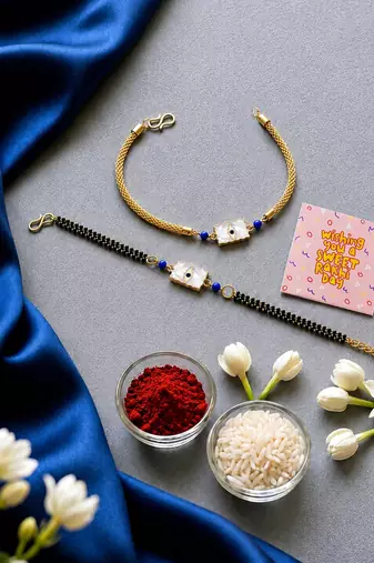 Elegant minimal evil eye bhaiya bhabhi rakhi set with pearl tassels