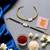 Elegant minimal evil eye bhaiya bhabhi rakhi set with pearl tassels