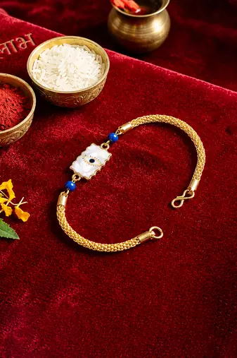 Elegant minimal evil eye bhaiya bhabhi rakhi set with pearl tassels