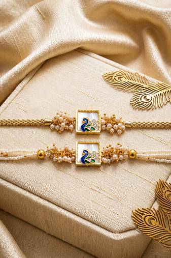 Royal peacock bhaiya bhabhi rakhi set with pearl clusters