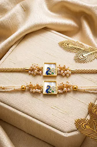Royal peacock bhaiya bhabhi rakhi set with pearl clusters