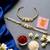 Royal peacock bhaiya bhabhi rakhi set with pearl clusters