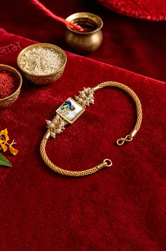 Royal peacock bhaiya bhabhi rakhi set with pearl clusters