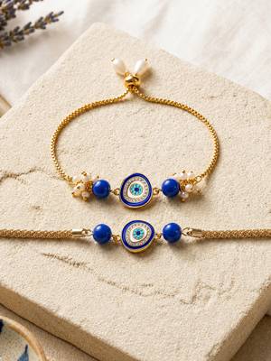 Blue evil eye bhaiya bhabhi rakhi set with pearl tassels 1