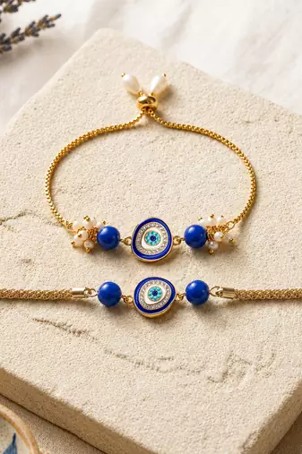Blue evil eye bhaiya bhabhi rakhi set with pearl tassels