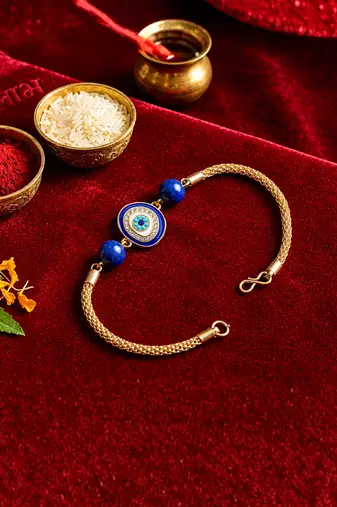 Blue evil eye bhaiya bhabhi rakhi set with pearl tassels