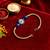 Blue evil eye bhaiya bhabhi rakhi set with pearl tassels