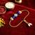Blue evil eye bhaiya bhabhi rakhi set with pearl tassels