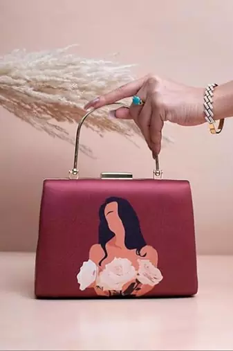 Maroon based floral girl portrait printed clutch bag for women with detachable strap