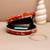 Regal orange  blossom clutch bag for women with detachable strap