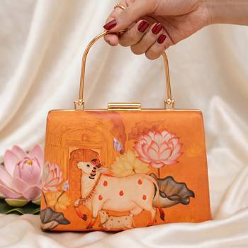 Divine cow lotus hand printed clutchbag for women with detachable strap 1
