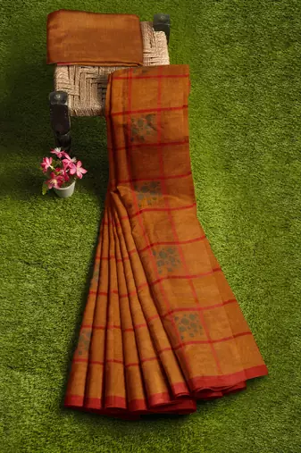 rust orange checked cotton blend saree with red border