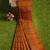 rust orange checked cotton blend saree with red border