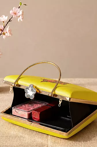 Printed heritage conch shell clutch bag for women with hand embroidery