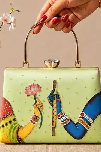 Printed divine harmony radha krishna clutch bag for women with hand embroidery