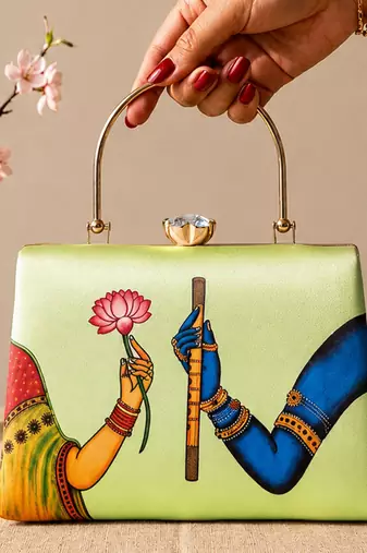 Printed divine harmony radha krishna clutch bag for women with hand embroidery
