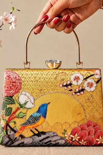 Printed golden songbird garden clutch bag for women with hand embroidery
