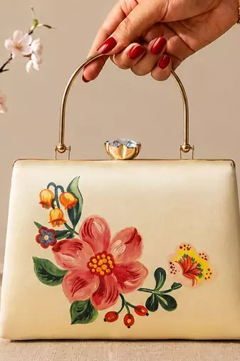 Ivory flower design clutch bag for women with detachable strap and handle
