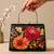 Black flower design clutch bag for women with detachable strap and handle