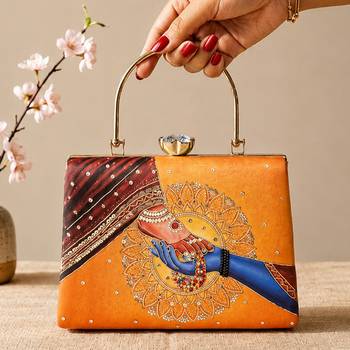 Printed divine hands traditional art clutch with hand embroidery 1