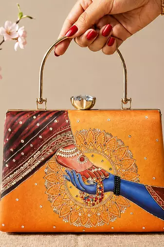 Printed divine hands traditional art clutch with hand embroidery
