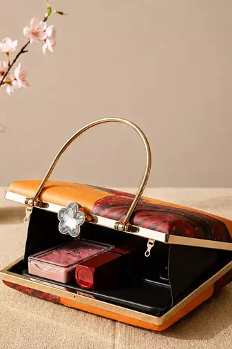 Printed divine hands traditional art clutch with hand embroidery