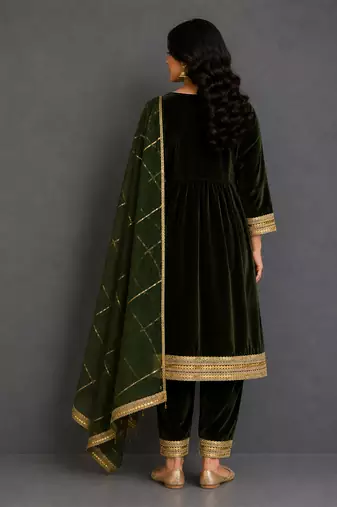 Bottle green embroidered velvet kurta set