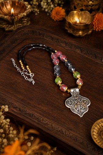 Ethnic heritage two tone pendant necklace