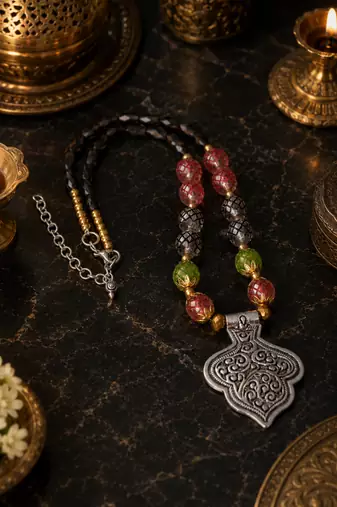 Ethnic heritage two tone pendant necklace