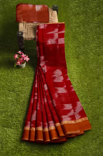 Crimson red ikat saree with mustard border