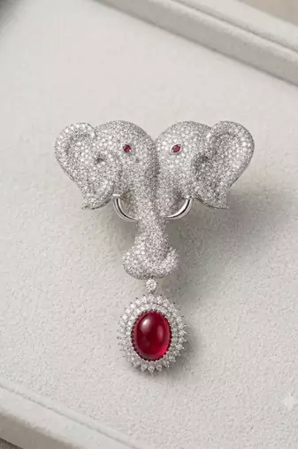 Silver plated ruby red stone twin elephant brooch