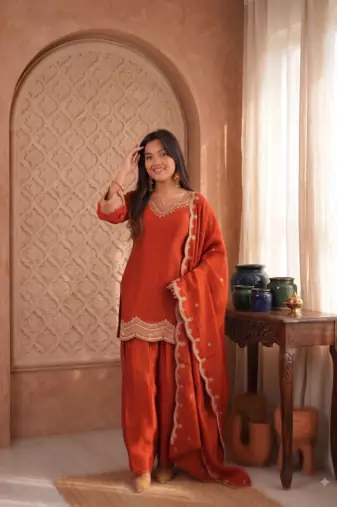 Rust orange embroidered kurti with farshi pant and dupatta set