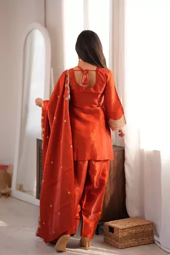 Rust orange embroidered kurti with farshi pant and dupatta set