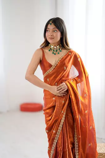 Orange festive trendy satin saree with two tone sequence embroidery
