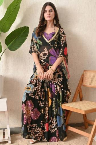 Straight fit kaftan top floral print georgette sharara pants in the matching print.