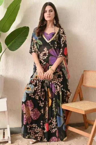 Straight fit kaftan top floral print georgette sharara pants in the matching print.