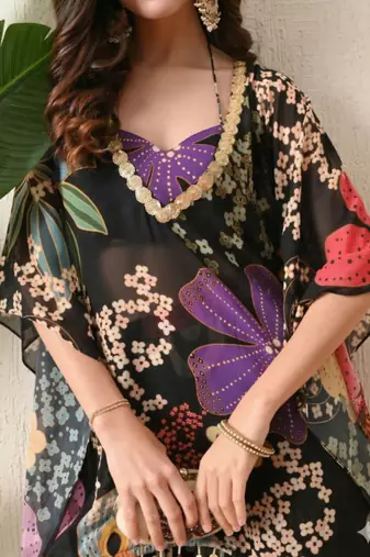 Straight fit kaftan top floral print georgette sharara pants in the matching print.